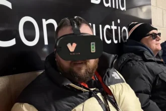 A visually impaired Dundee United fan sees his team live for the first time using a vision enhancing headset at a home match in Scotland stadium